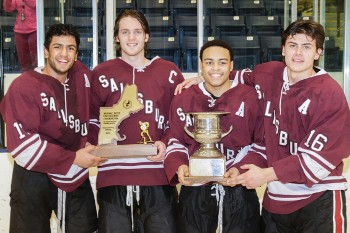 Salisbury seniors Vimal Sukumaran, James Gobetz, Quincy Gregg, and Kale Kane holding the hardware.