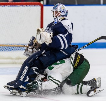 Nobles' junior goalie Marc Smith finds a comfortable place from which to take in some Flood-Marr action.