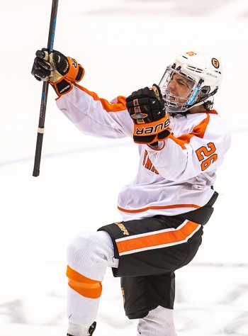 KUA's Paul Dore celebrates his game-winning goal, scored with 52 seconds left in the third period on Sunday March 3rd at Manchester, NH. The goal gave