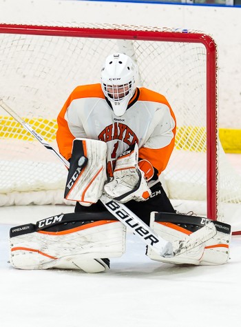 Thayer's Jimmy Scannell makes a third period save in 3-2 win at Andover Wednesday.