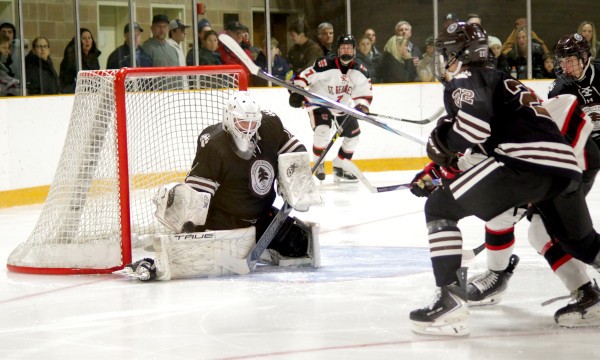 Brunswick junior G Zai Ferraro makes a glove stop in the Bruins' season-opening 6-1 home win over St. George's on Wednesday Nov. 19.