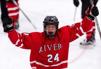 Rivers senior F Brett Rahbany celebrates after the final buzzer.