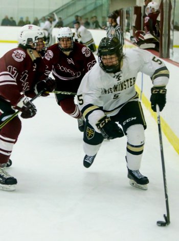 Salisbury's Nick Capone (17) and Brendan Reynolds (27) close in on Westminster's Ned Blanchard (5) in Wednesday quarterfinal action.