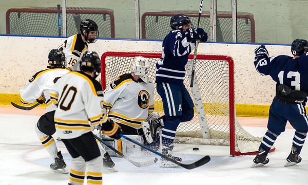 Andover's Mac Carso celebrates his third period GWG in Wednesday's 3-2 win over Tilton.