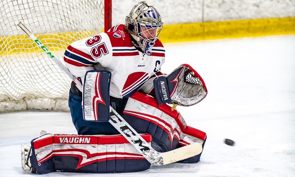 Dexter senior Derek Mullahy, a Harvard recruit, with one of his 28 saves in a 2-1 win at Thayer on Jan. 18th.
