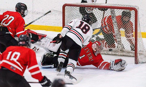 St. Sebastian's senior F Connor Joyce beats Rivers senior G Casen Janko with this first period goal to tie Wednesday's game at 2-2. Seb's would go on